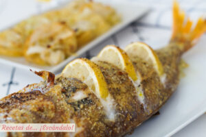 Besugo al horno con patatas al vino y limón